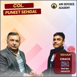 Col. Puneet Sehgal congratulating Rehan for cracking NDA at AIM Defence Academy